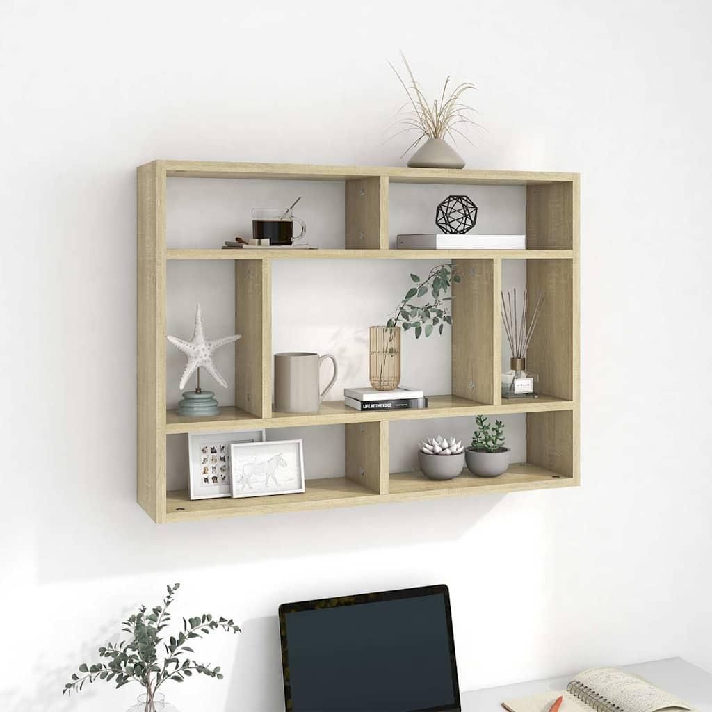 A wooden wall shelf mounted on a white wall, decorated with various items.