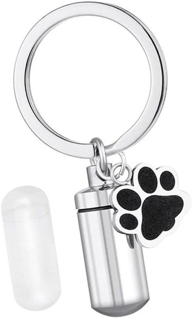 Porte-clé patte d'animal avec capsule transparente pour mèche de poils