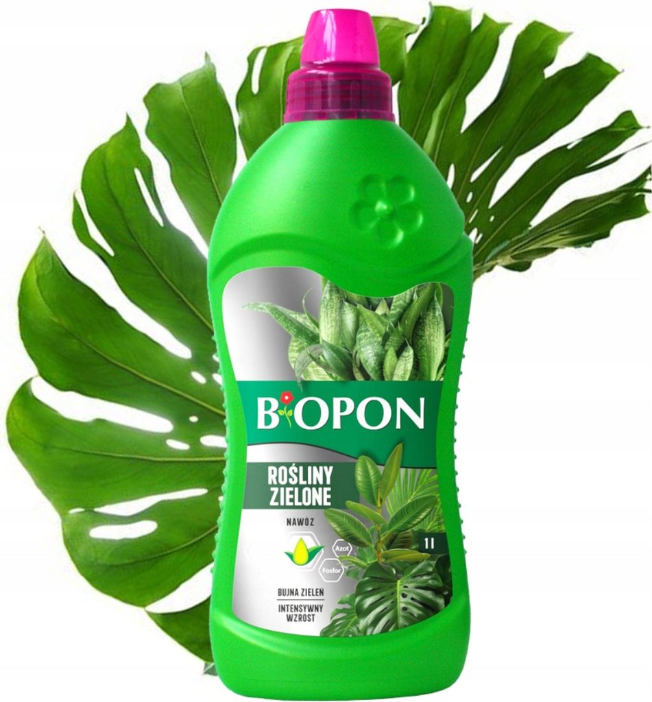 A bottle of liquid fertilizer for green plants, with large green leaves in the background.