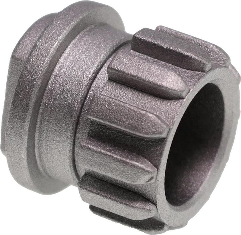 A close-up studio shot of a metal meat grinder coupling.