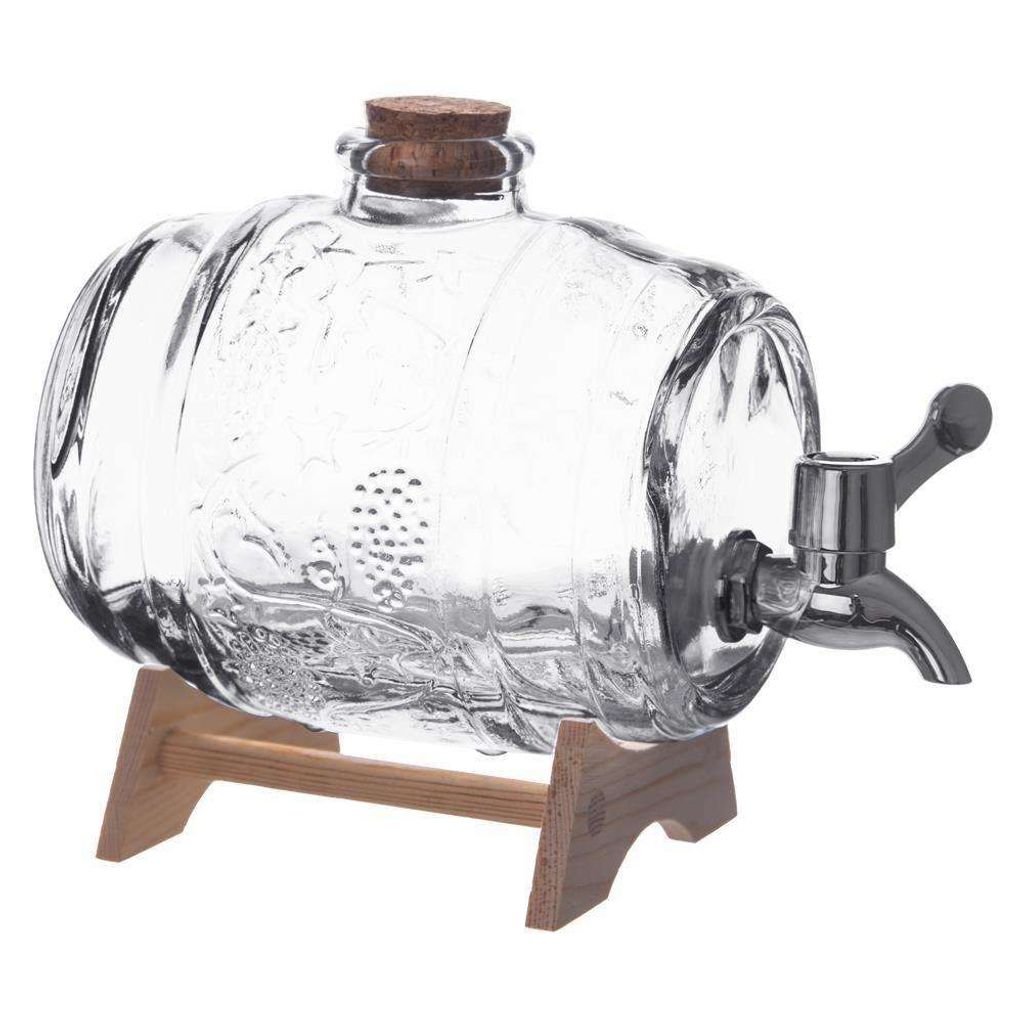 A clear glass barrel-shaped beverage dispenser with a metal spigot and a wooden stand.