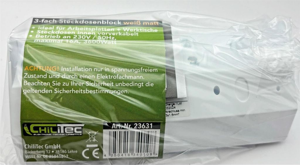 A product wrapped in clear plastic packaging, showing a label with product information and a barcode.