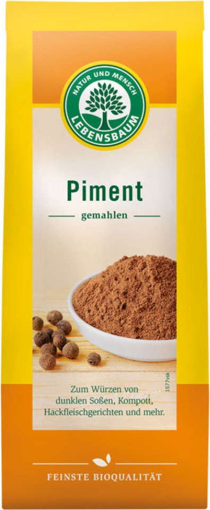 A product shot of a box of ground piment (allspice) with a bowl of the spice and whole allspice berries shown.