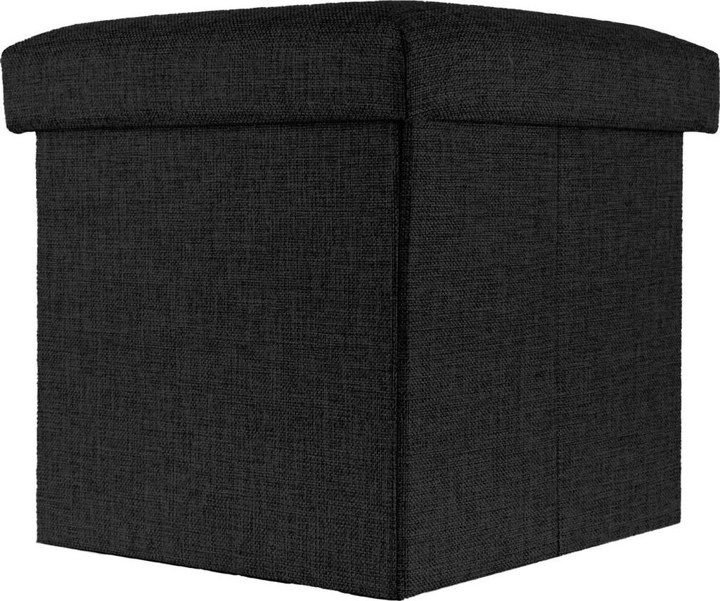 A black fabric storage ottoman is shown from a three-quarter angle against a white background.