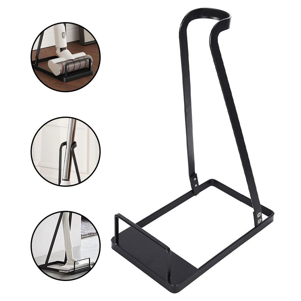 A black metal stand for storing cleaning tools like vacuum cleaners and mops.