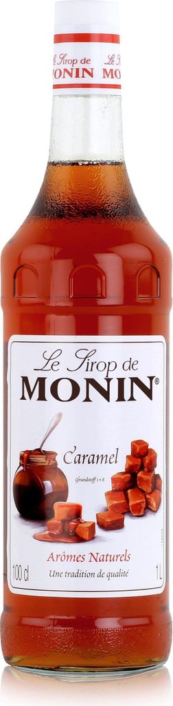 A bottle of Monin Caramel syrup against a white background.
