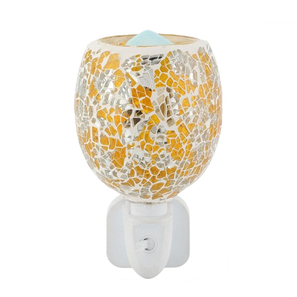 A mosaic glass electric aroma lamp plugged into a wall socket.