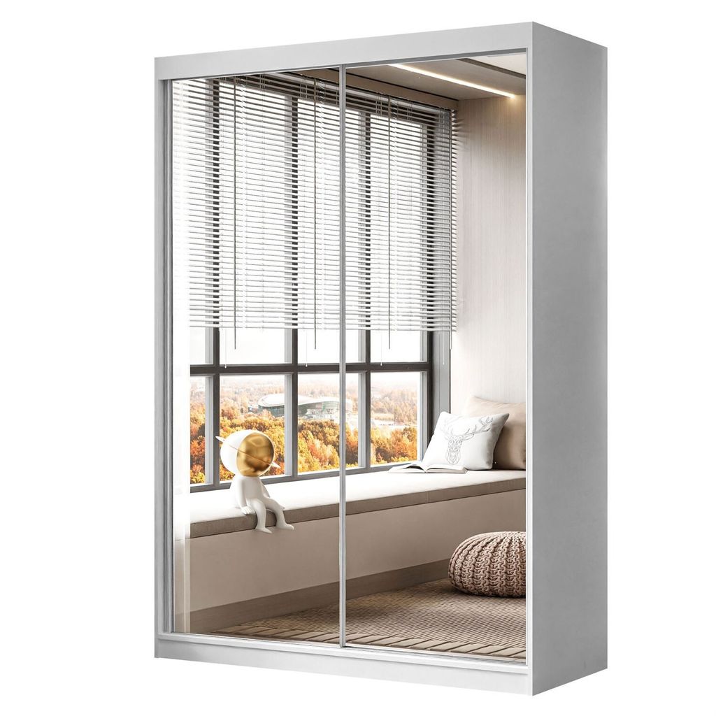 A white sliding door wardrobe with mirrored doors reflecting a window with blinds and a window seat.