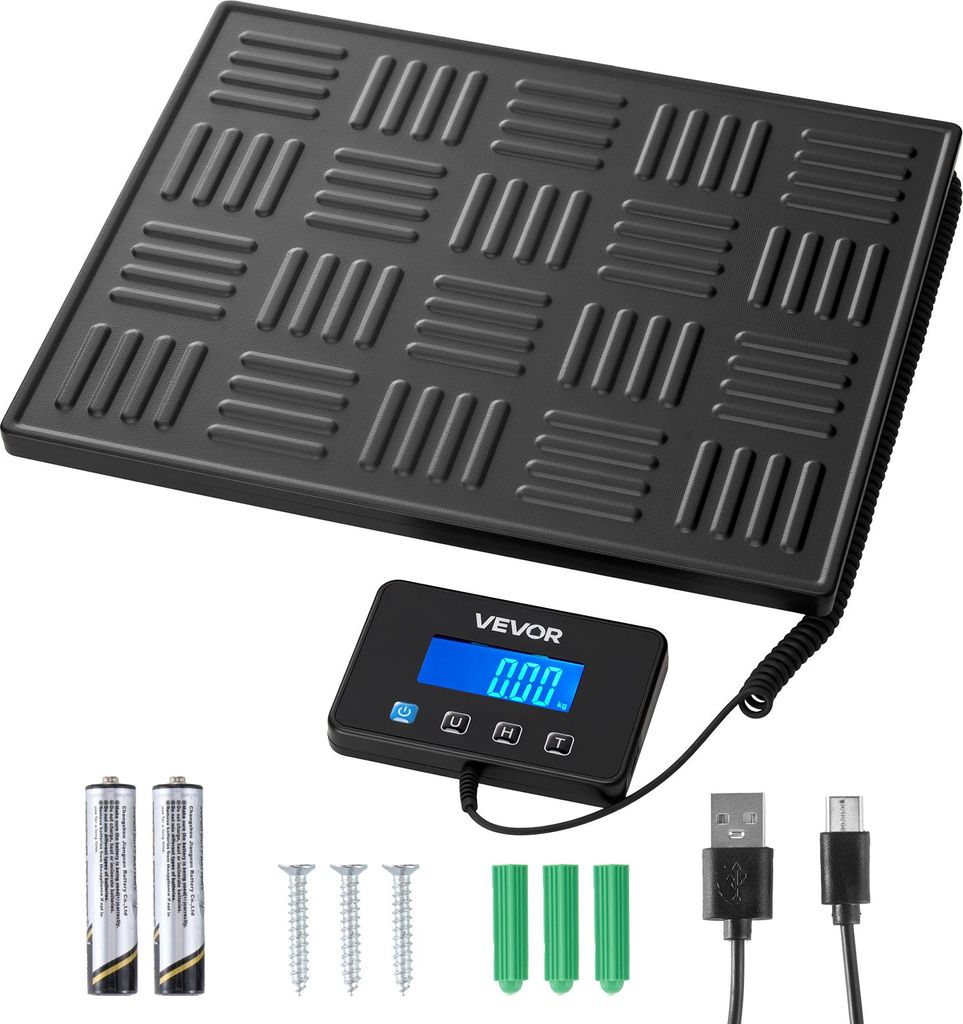 A digital scale with its accessories laid out on a white background.