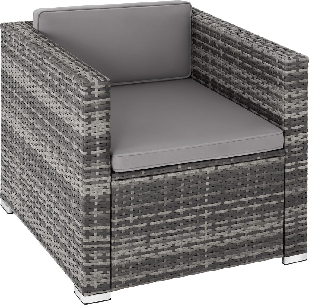 A single gray rattan armchair with gray cushions, shown from a slightly elevated side angle.