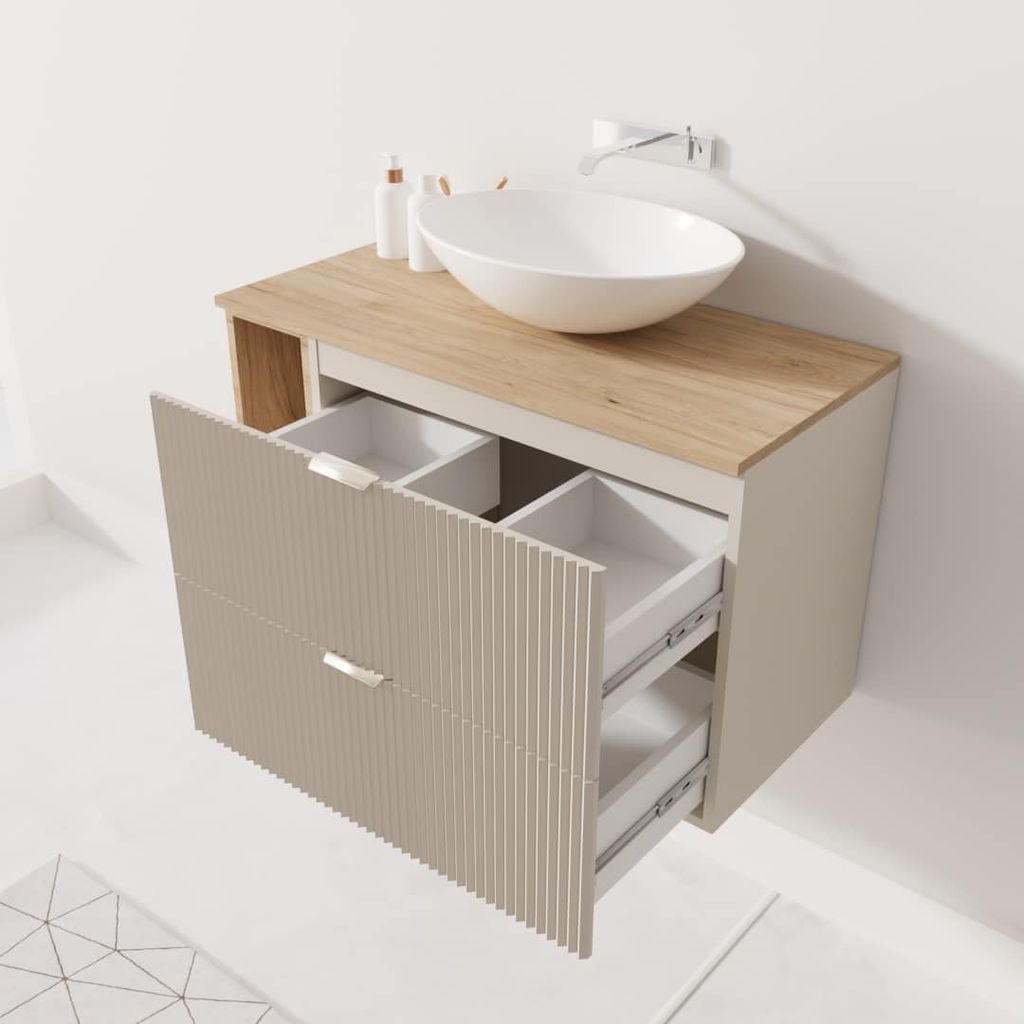 A bathroom vanity with a sink and open drawers.