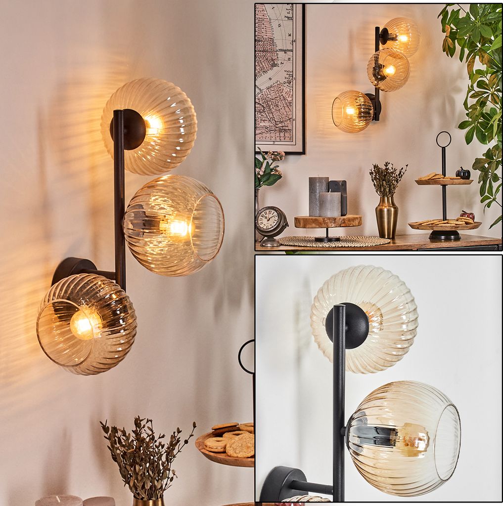 Cesaro Wandlampe aus Metall/Riffelglas in Schwarz/Bernsteinfarben/Klar