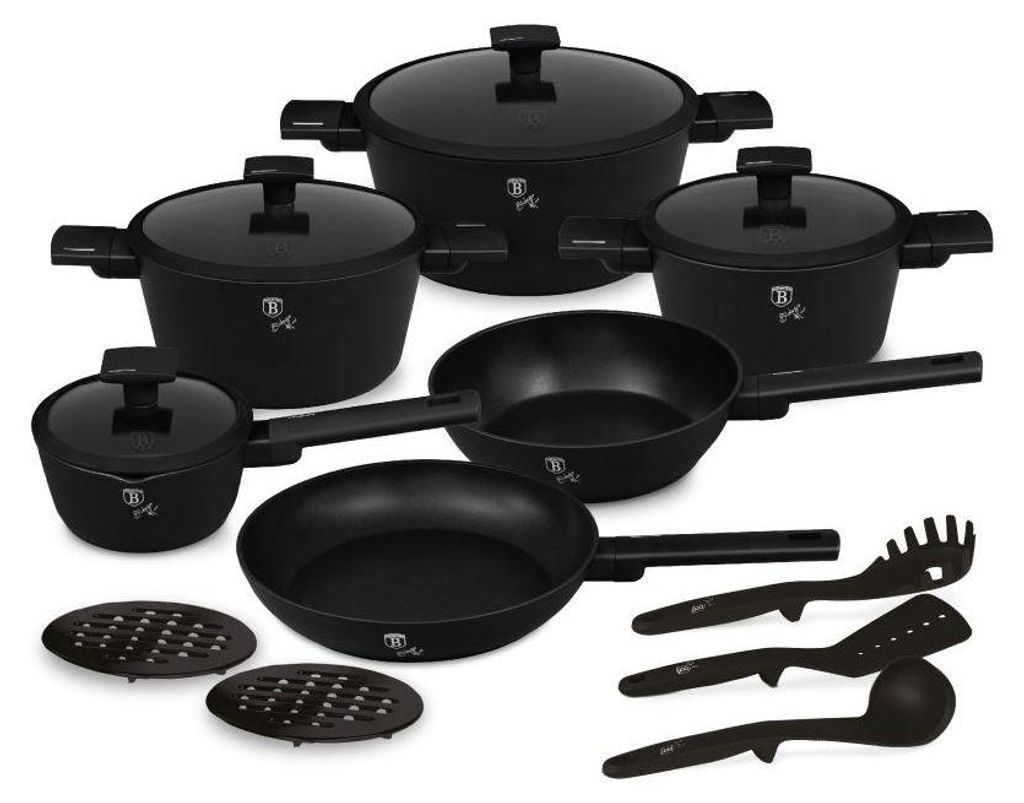 A collection of black cookware and utensils arranged on a white background.