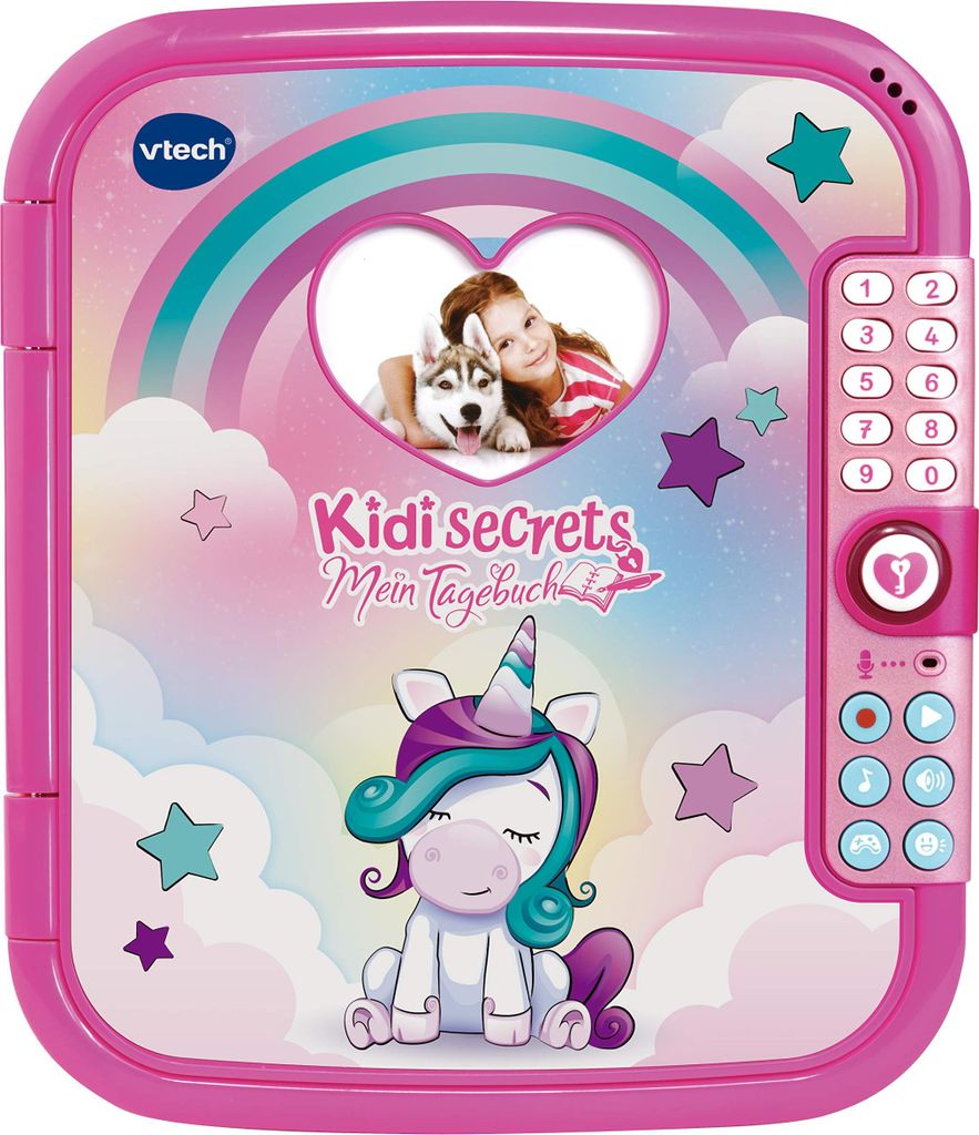 A pink Vtech Kidi Secrets diary with a unicorn and rainbow design, featuring a photo of a girl and a dog.