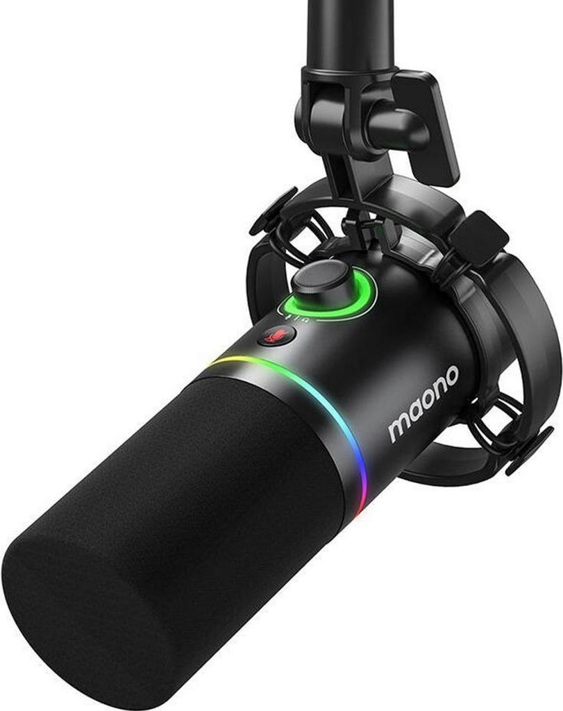 A black Maono PD200X podcast microphone is shown suspended from a stand against a white background. The microphone has a foam windscreen and features a ring of colorful LED lights around its body, as well as a green illuminated control knob.