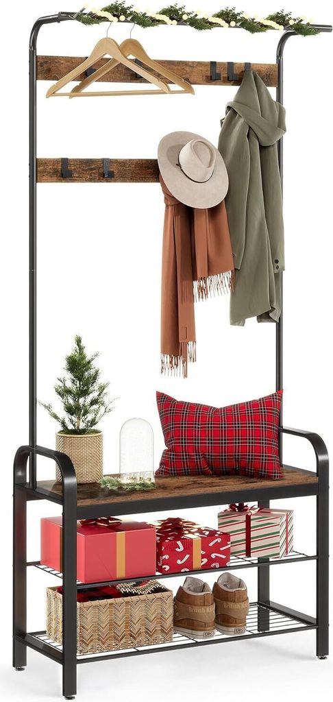 A coat rack with shelves, decorated for Christmas.