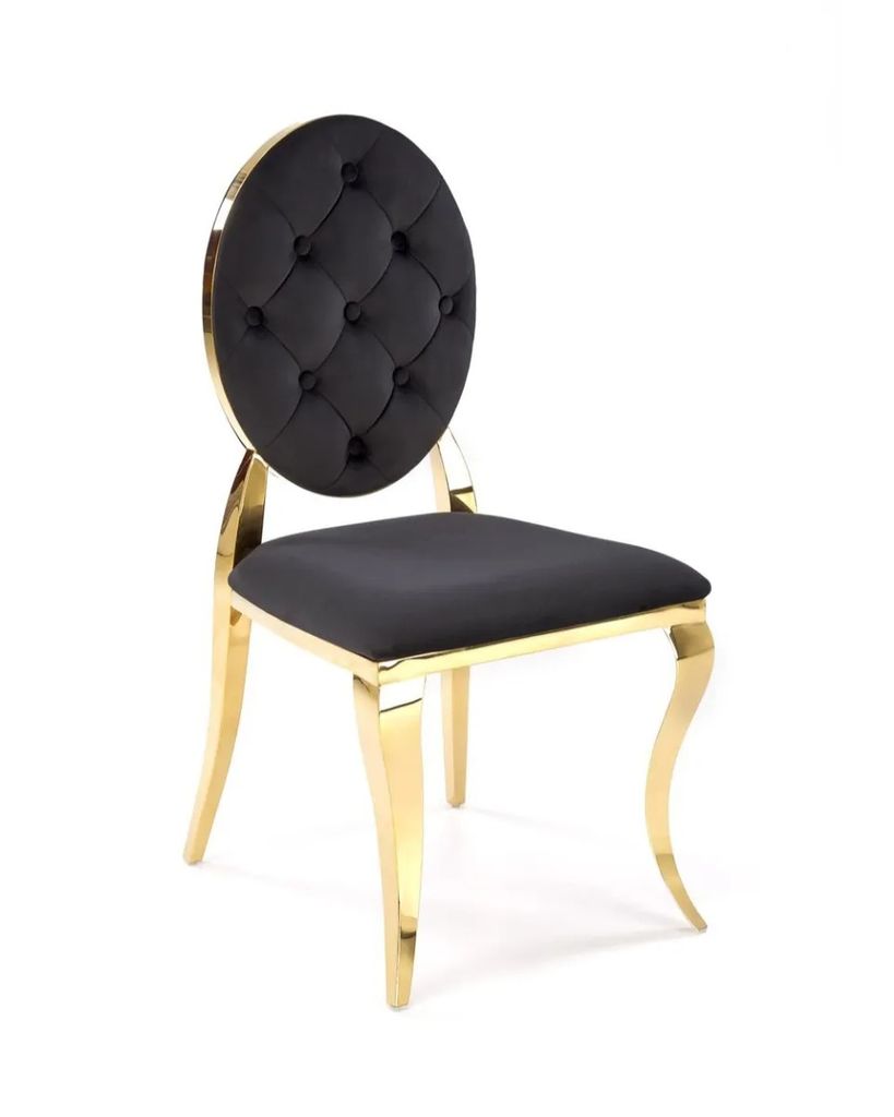 A single black and gold chair is shown against a white background.