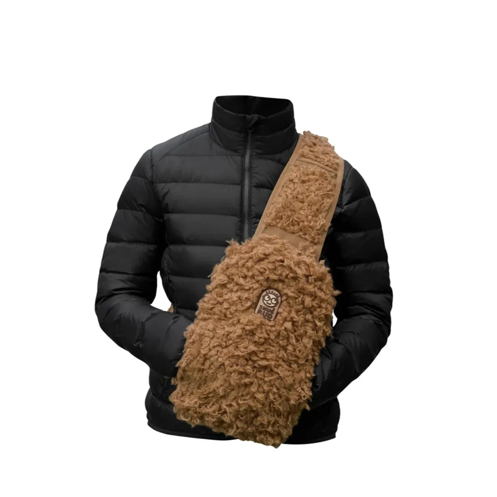 Dites Adieu au Froid avec le Sac à Dos Chauffant Snugbud Junior Marron