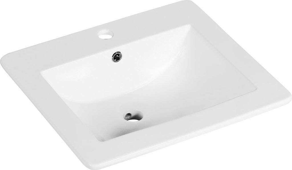 A white ceramic sink with a faucet hole and a drain hole, shown from a diagonal top-down view.