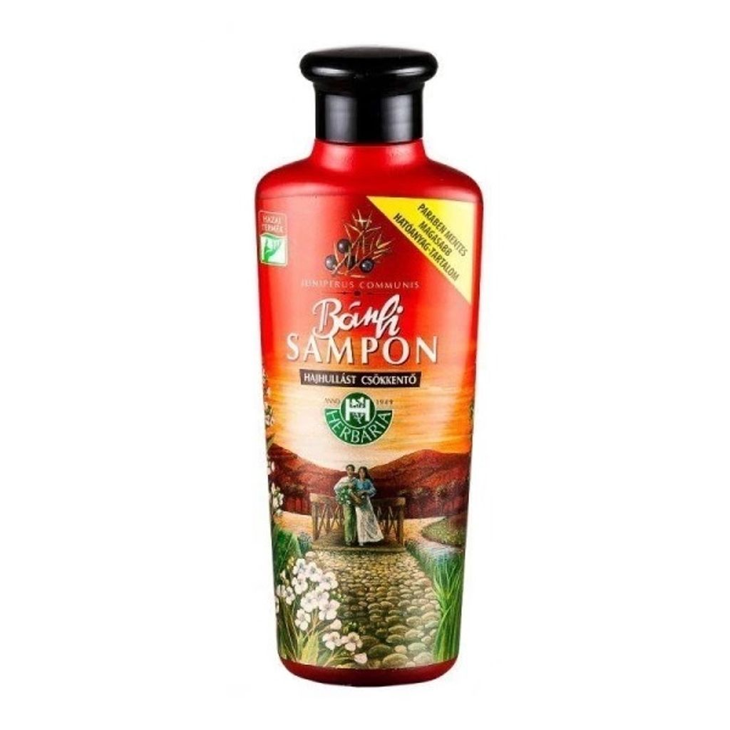 A bottle of Herbaria Bánfi Shampoo against hair loss, with a scenic illustration on the label.