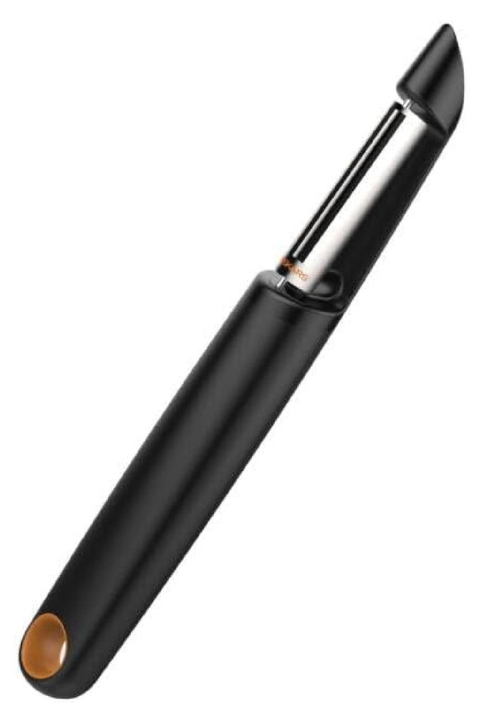 A black peeler with a silver blade and a copper accent on the handle, shown against a white background.