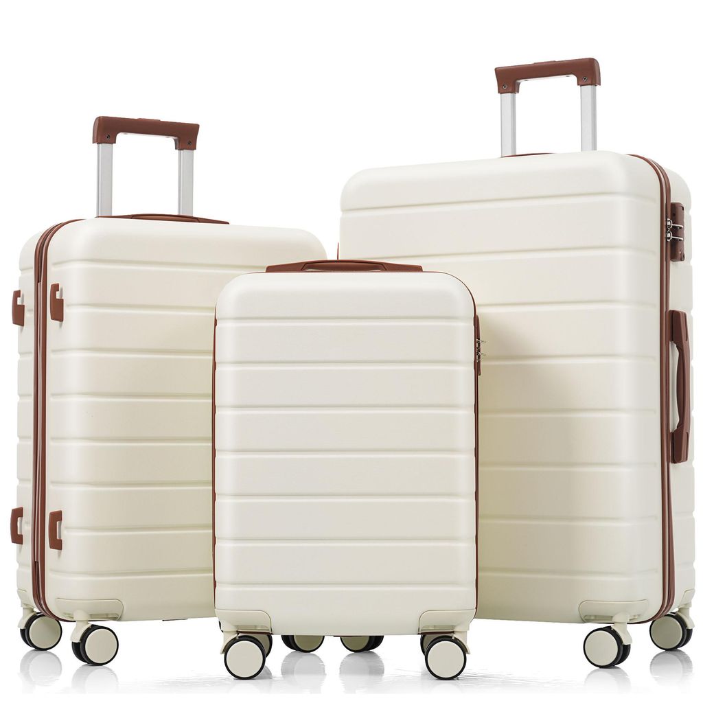 Three suitcases of varying sizes are displayed against a white background.