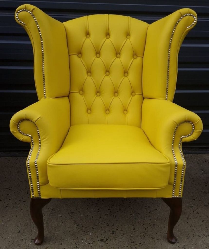 Casa Padrino Luxus Chesterfield Ohrensessel Gelb / Dunkelbraun 98 x 90 x H. 110 cm - Echtleder Chesterfield Wohnzimmer Sessel - Wohnzimmer Möbel -...