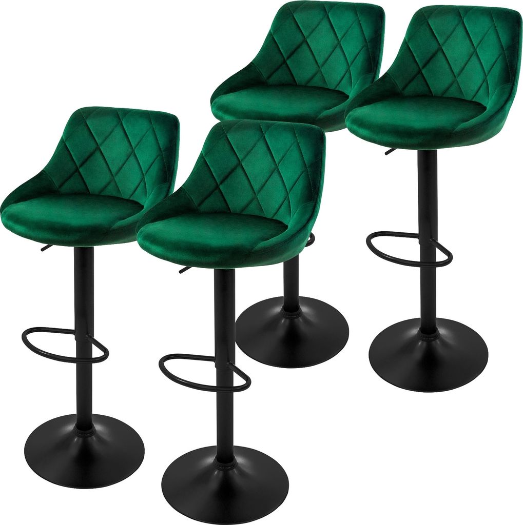 Four green velvet bar stools with black bases and adjustable height.