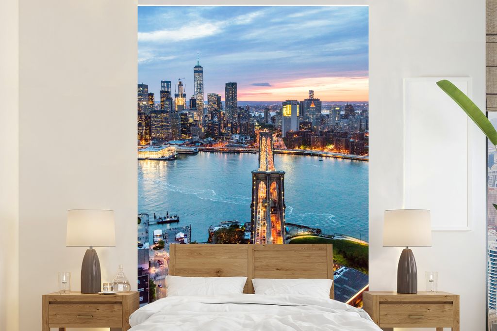 MuchoWow Fototapete für Wohnzimmer oder Schlafzimmer Wandtapete Vinyl Motivtapete Ein Luftbild der New Yorker Brooklyn Bridge bei Sonnenuntergan...
