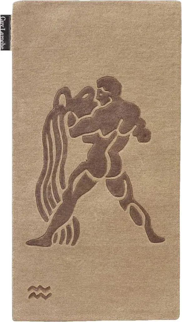 Tapis en laine fait main RIUS : motifs géométriques et confort haut de gamme