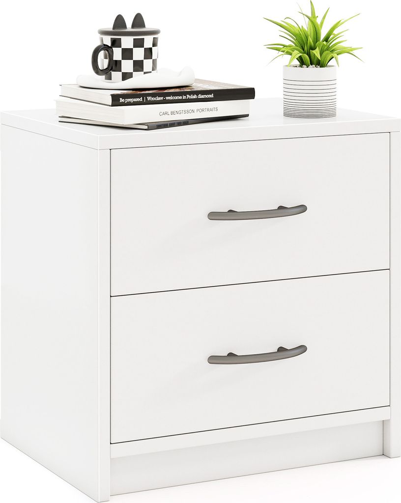A white nightstand with two drawers is shown against a white background. There are books and a plant on top of the nightstand.
