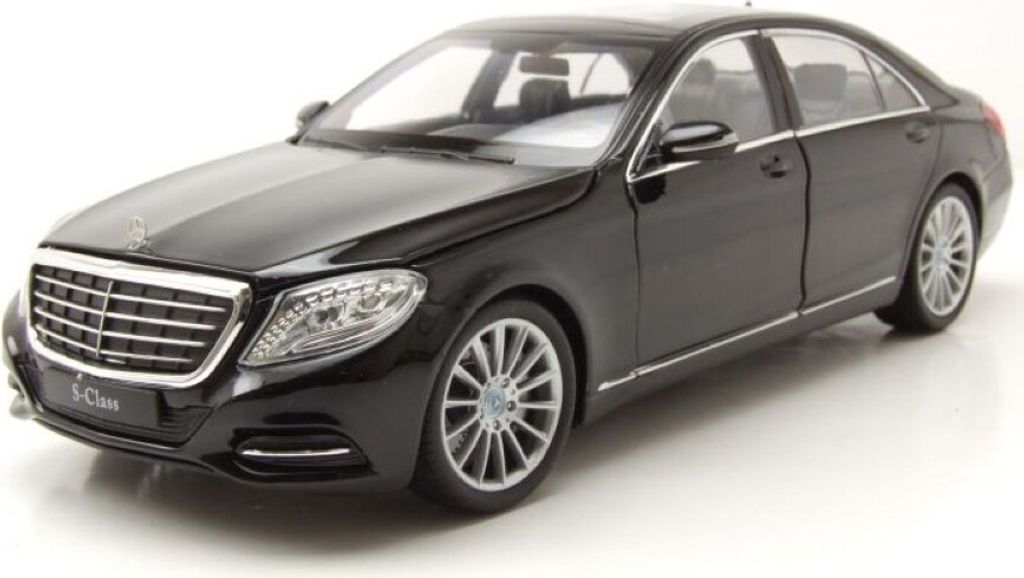 A black Mercedes S-Class W222 model car is shown from a front-side angle against a white background.