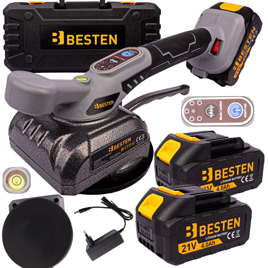 A collection of tiling tools and accessories, including a vibrator, batteries, charger, and case.