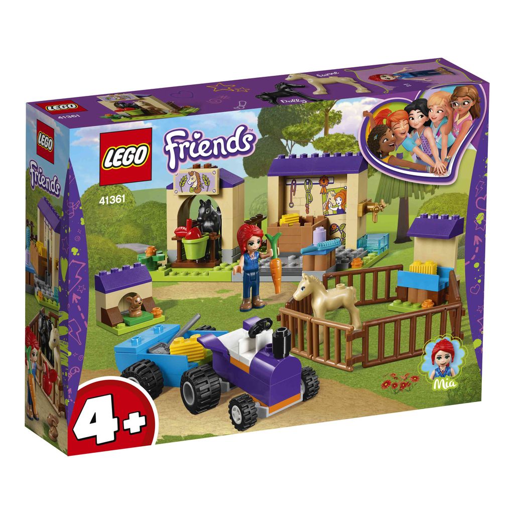 The image shows the packaging of a LEGO Friends playset, featuring a stable and horse-related accessories.