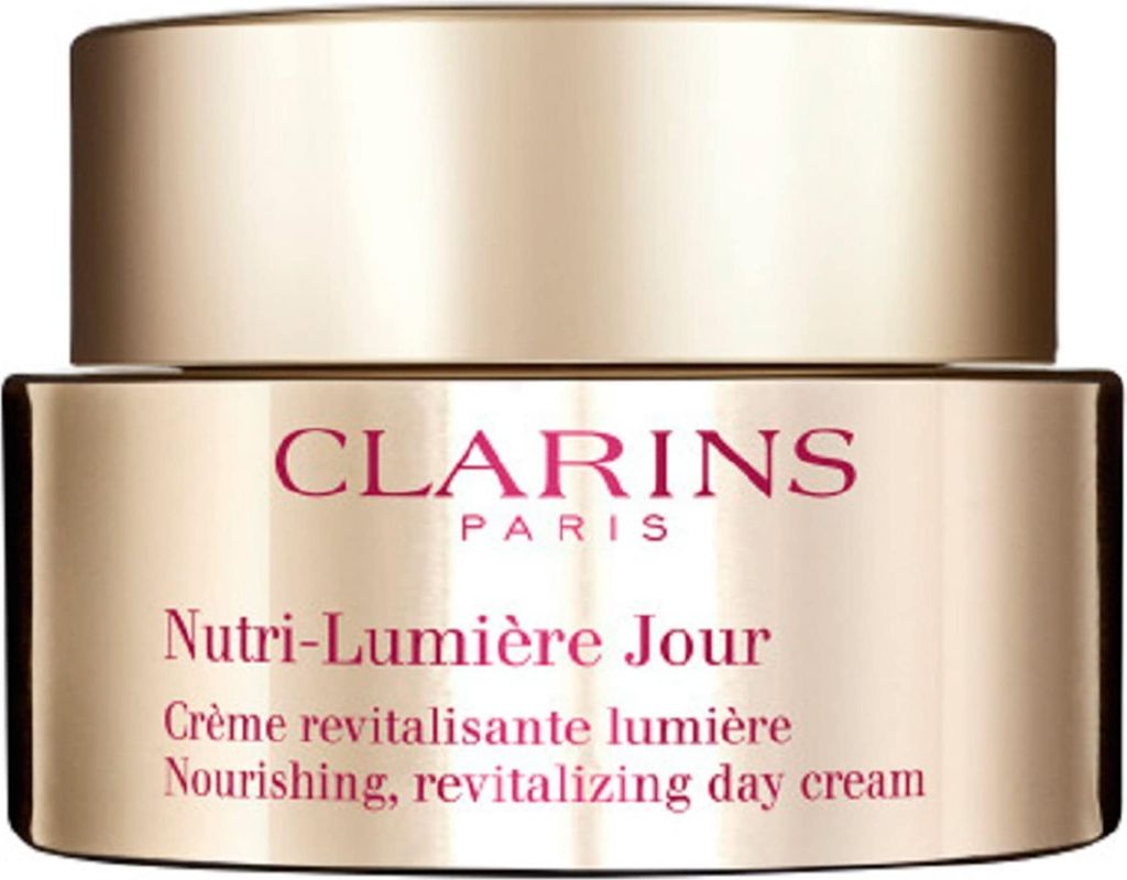 A close-up studio shot of a Clarins Nutri-Lumière Jour day cream jar.