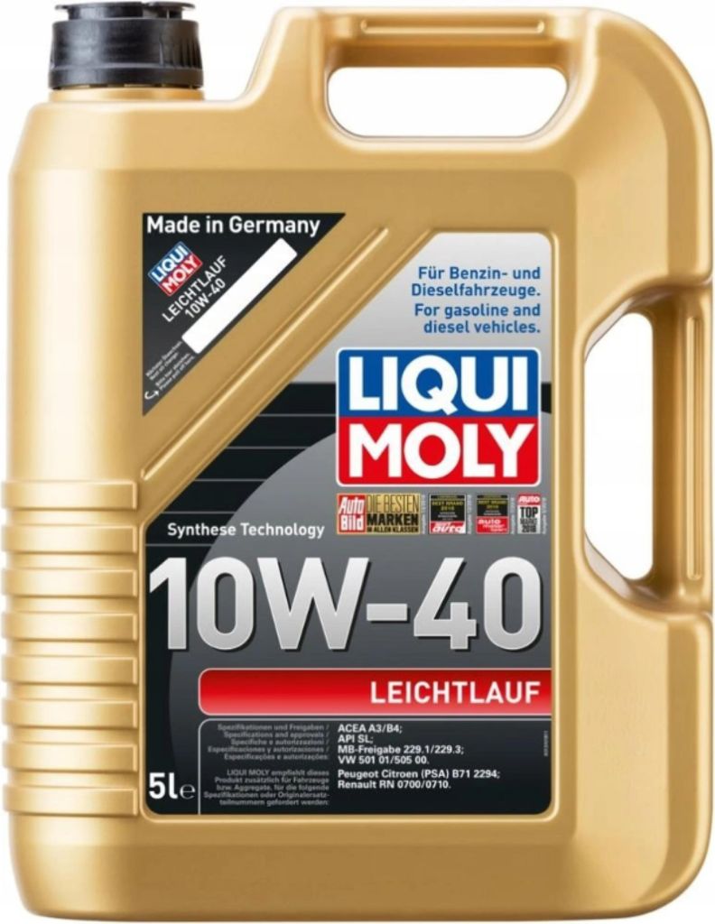 A gold plastic container of motor oil with labels.