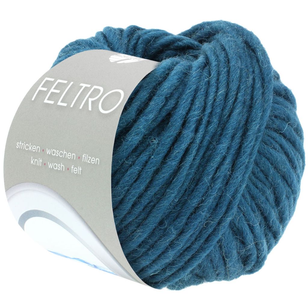 A ball of teal yarn with a label.