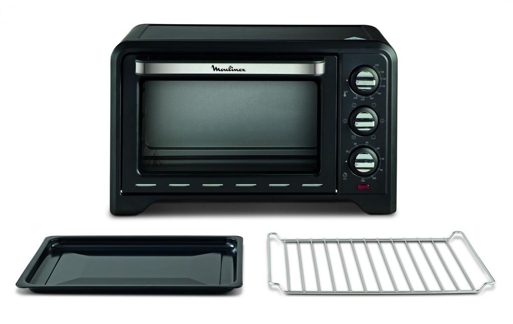 A black countertop oven with a silver trim and controls, shown with a baking tray and a wire rack.