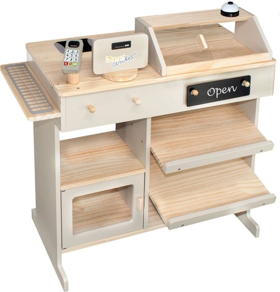 A wooden toy cash register with shelves and accessories.