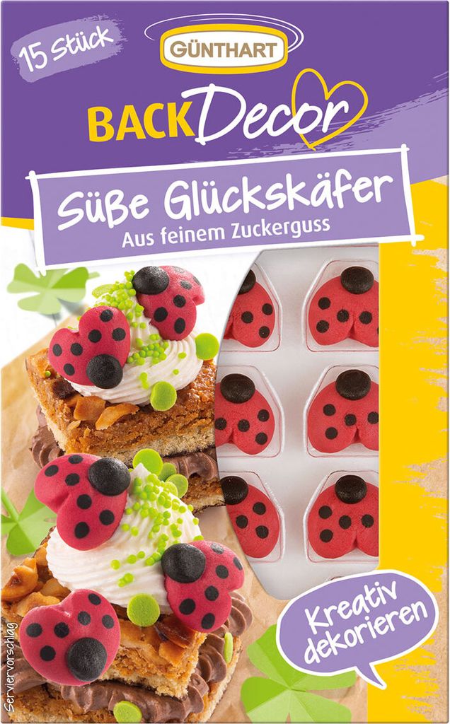 A box of GÜNTHART BackDecor sweet ladybugs made of fine icing, with a sample of decorated cakes shown.