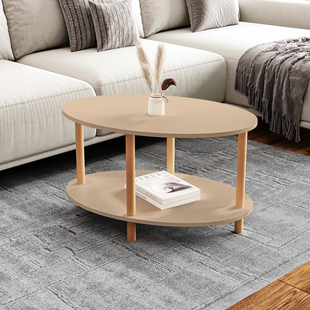 A coffee table with a book and vase on it, placed in a living room setting.