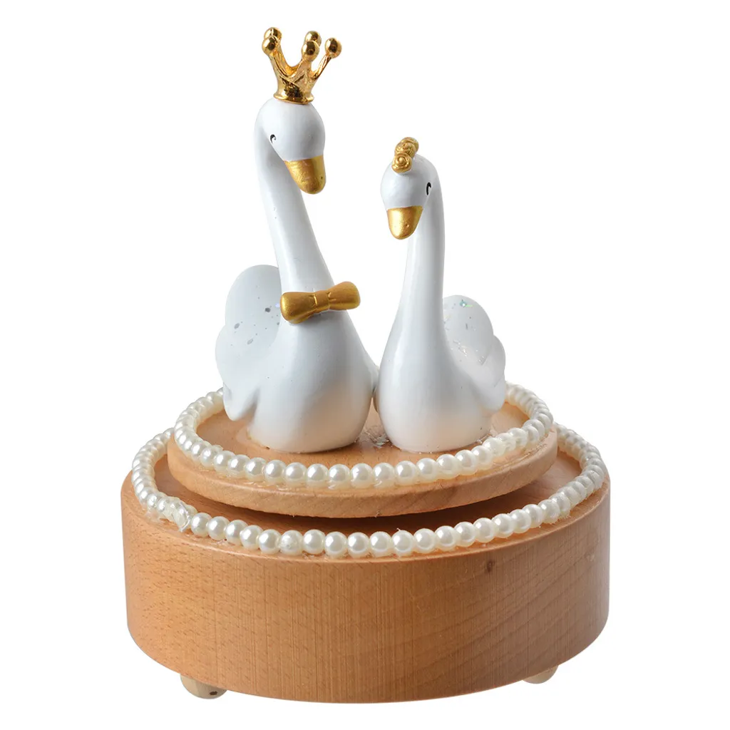 Boîte à musique cygne beige bois - Solution déco apaisante pour chambre