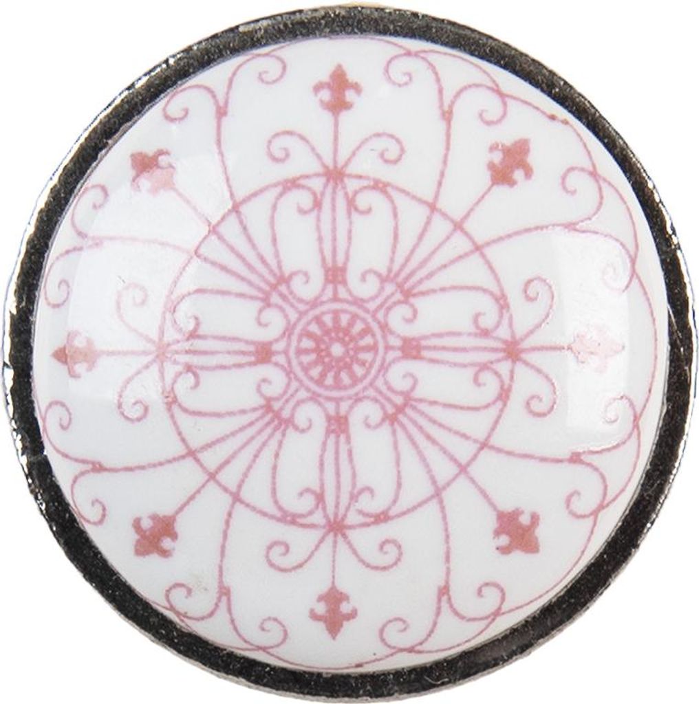 A close-up, top-down view of a single decorative knob.