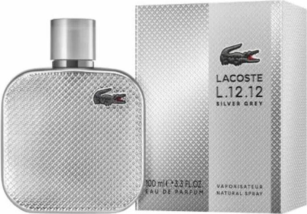A bottle of Lacoste L.12.12 Silver Grey Eau De Parfum and its packaging are displayed against a white background.