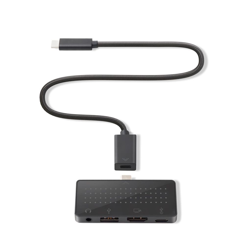 A black USB-C hub with multiple ports and a connected USB-C cable is shown against a white background.
