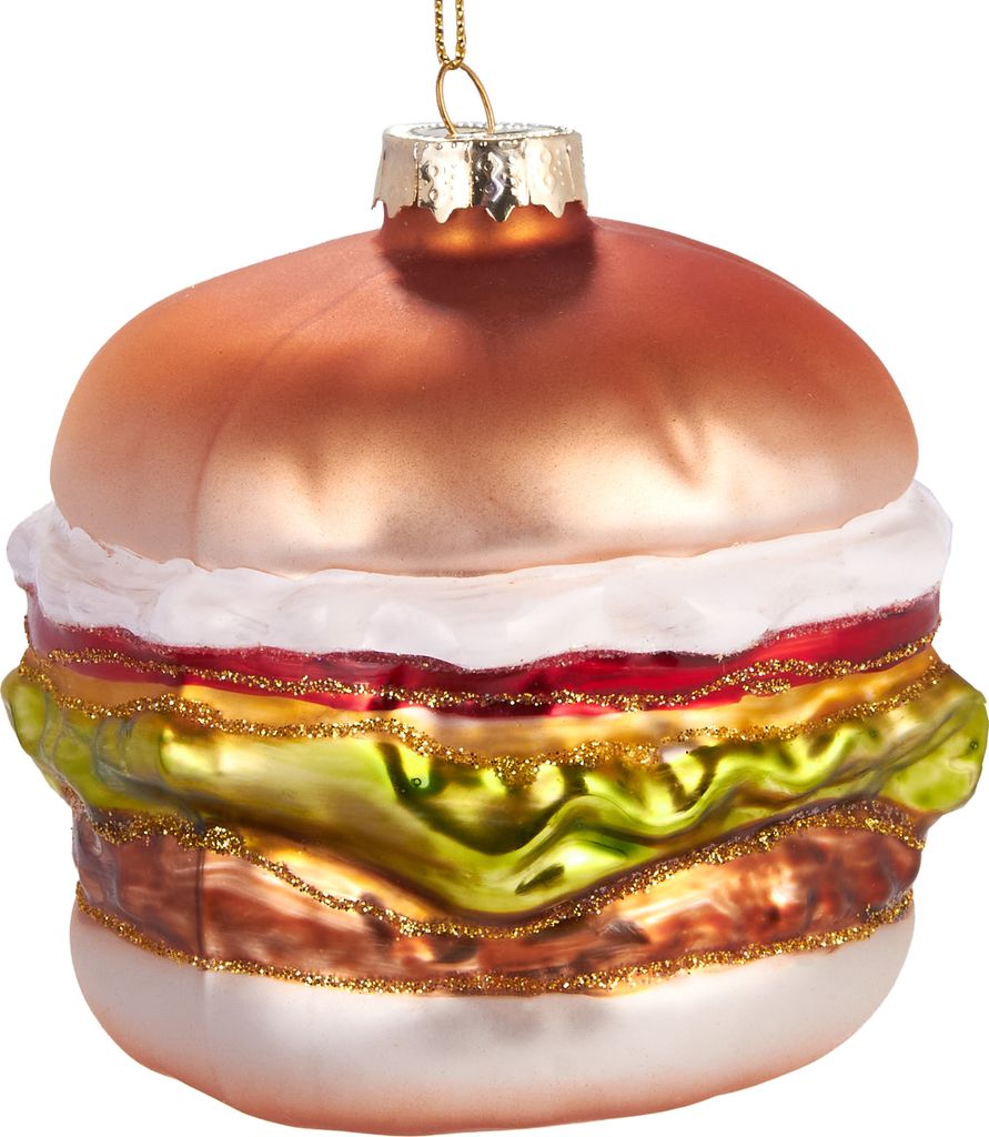 A glass ornament shaped like a hamburger, hanging from a gold string.