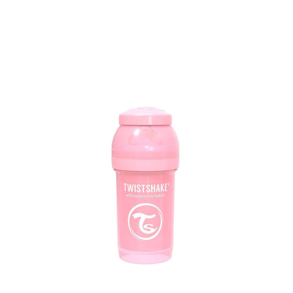 A pink baby bottle with a lid, isolated on a white background.
