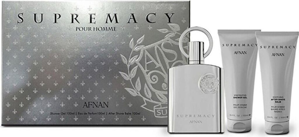 A gift set of men's fragrance products, including a perfume bottle and two tubes of body care products, displayed next to its packaging.