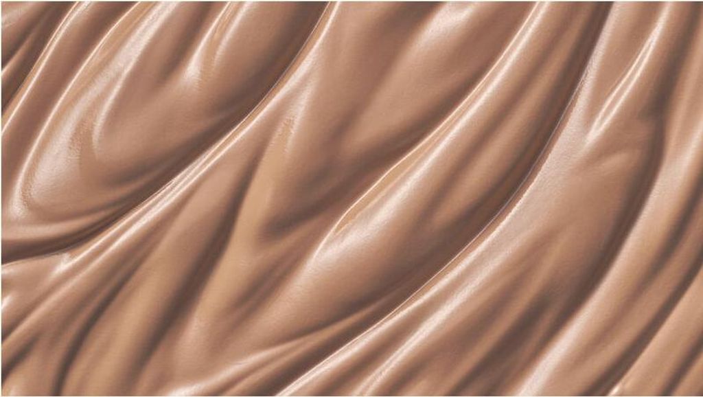A close-up abstract shot of flowing, rippling fabric or liquid.