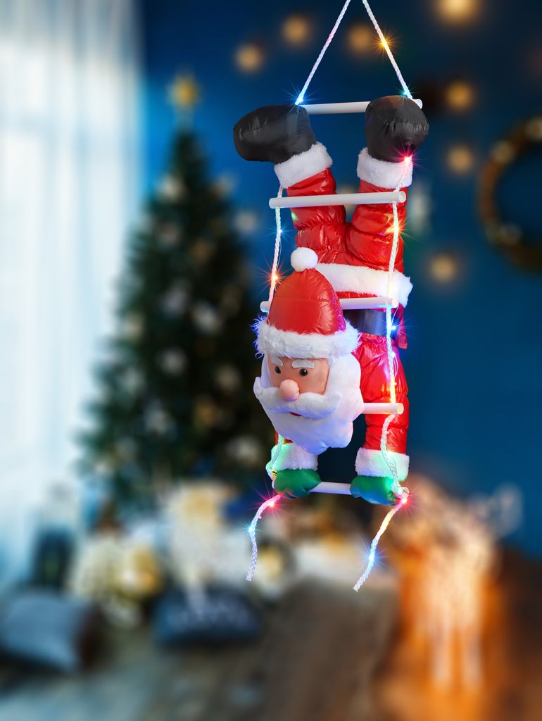 Weihnachtsmann kopfüber auf Strickleiter, die | Weihnachtsbaumkerzen